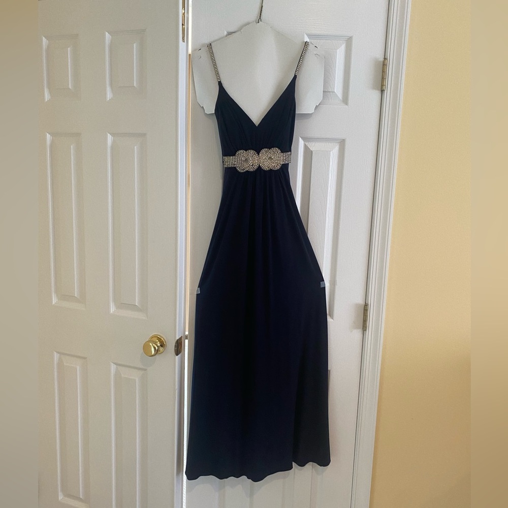 Navy gown with silver straps and embellishment